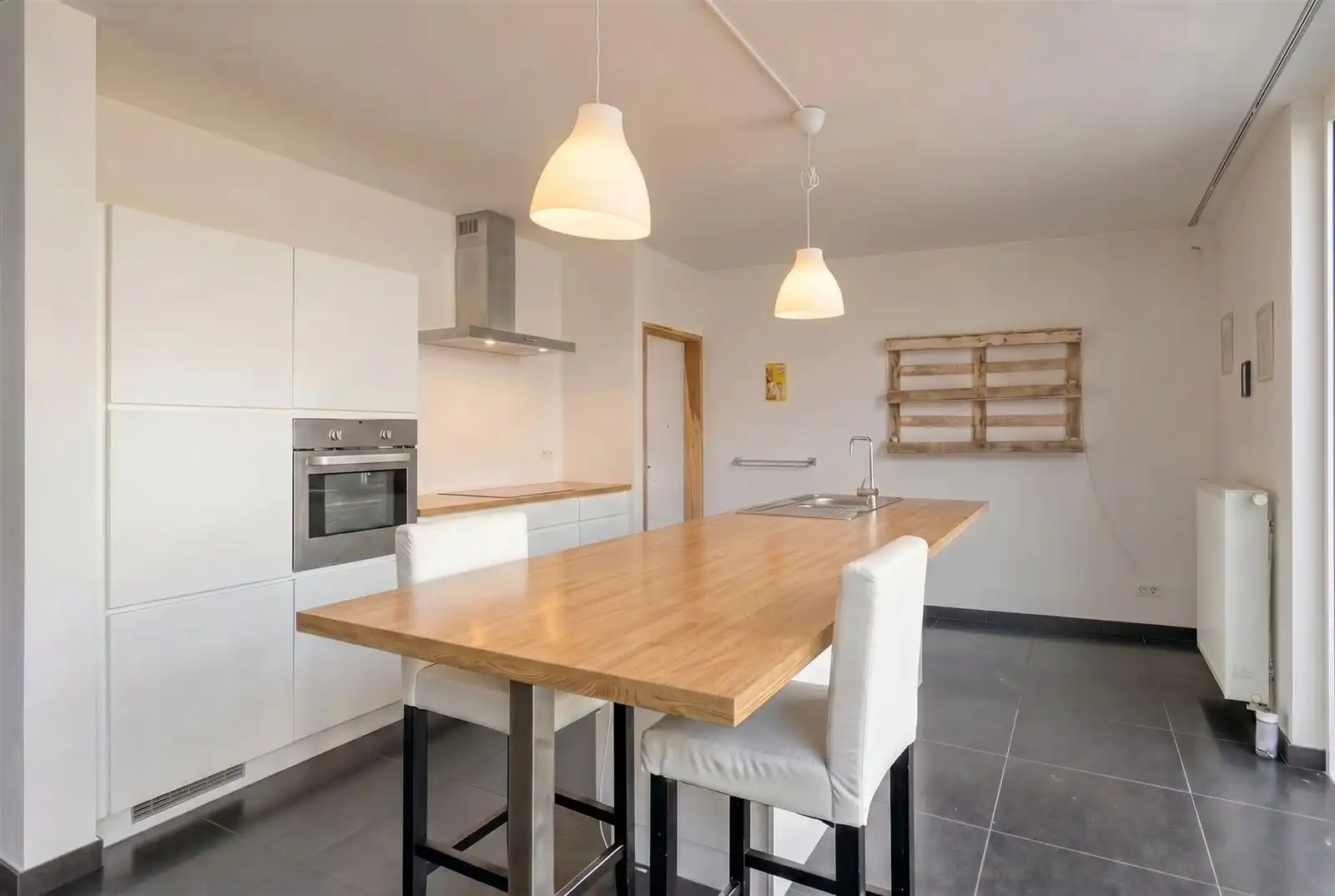 Unieke moderne triplex appt  met ruime garage op toplocatie in een steegje van de Kouter foto 9