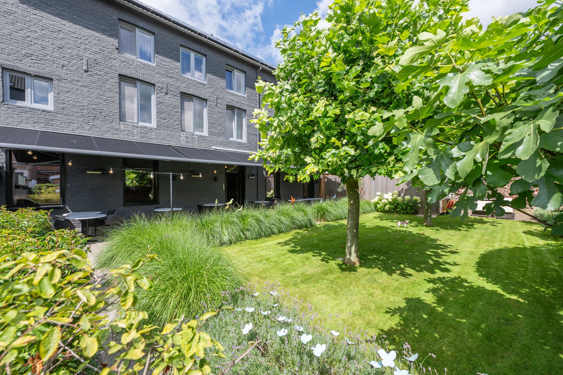 UNIEK HANDELSHUIS MET PRACHTIGE TUIN OP 4A33CA IN HET CENTRUM VAN TONGEREN. foto 41