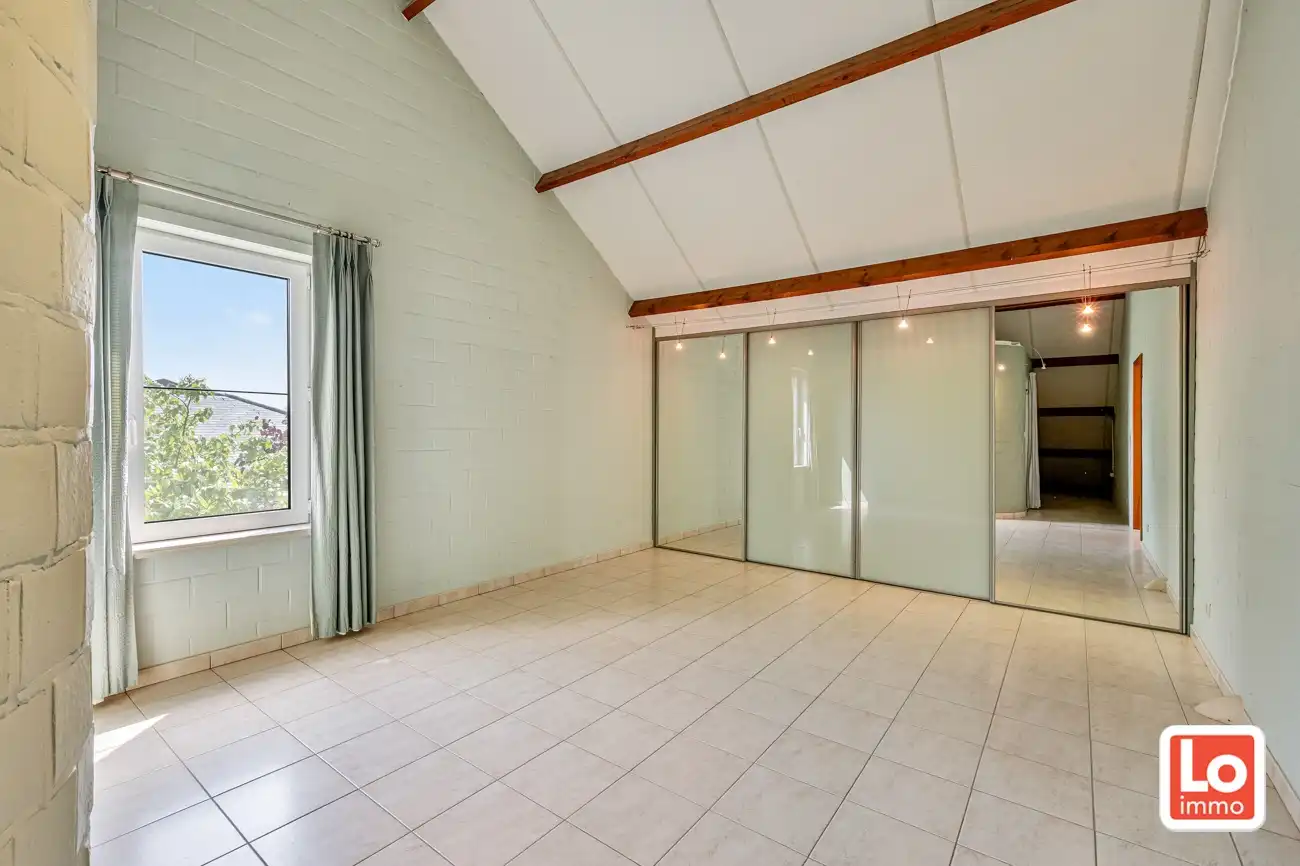 Degelijke open (kangoeroe)woning met inpandige garage en gezellige zuidwest georiënteerde tuin op een rustige locatie nabij het centrum van Lochristi! foto 26