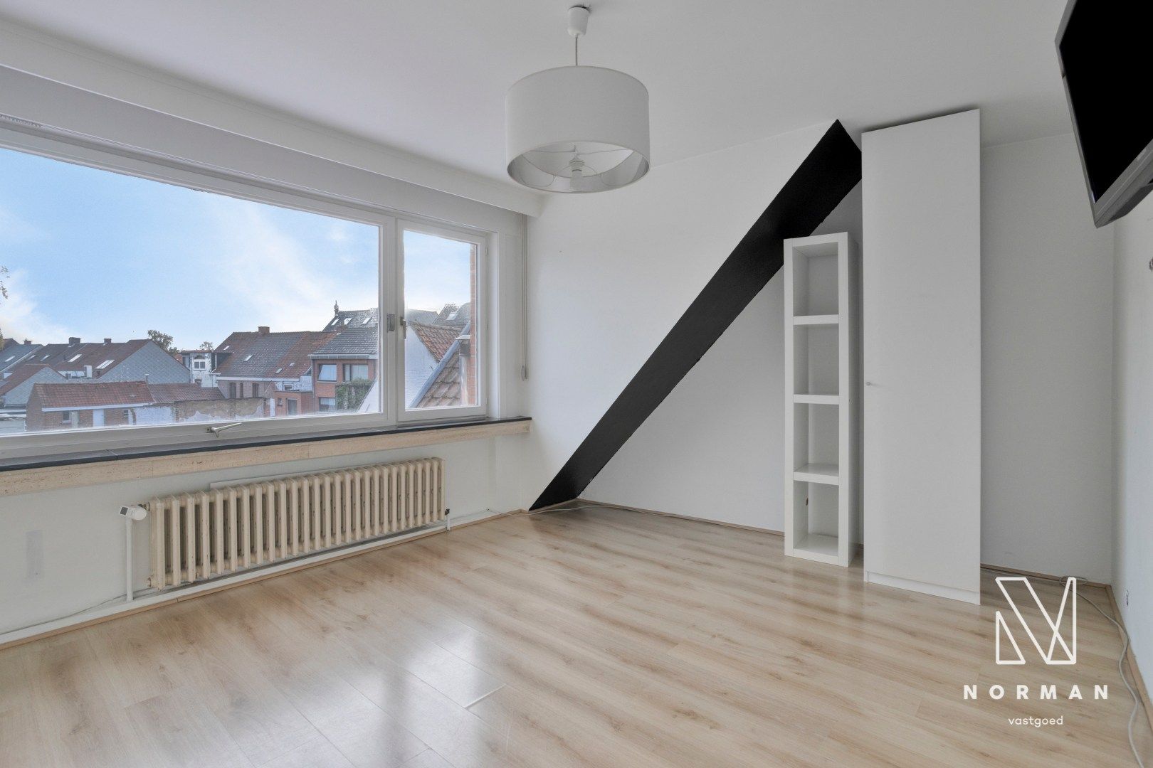 Duplex te koop in het centrum van Kuurne met 3 slaapkamers en een groot zongericht terras met tuinhuis.  foto 22