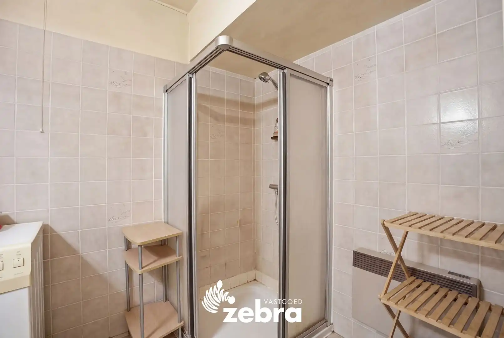 Gelijkvloers 2-slaapkamerappartement met terras en garage in centrum Tielt! foto 10