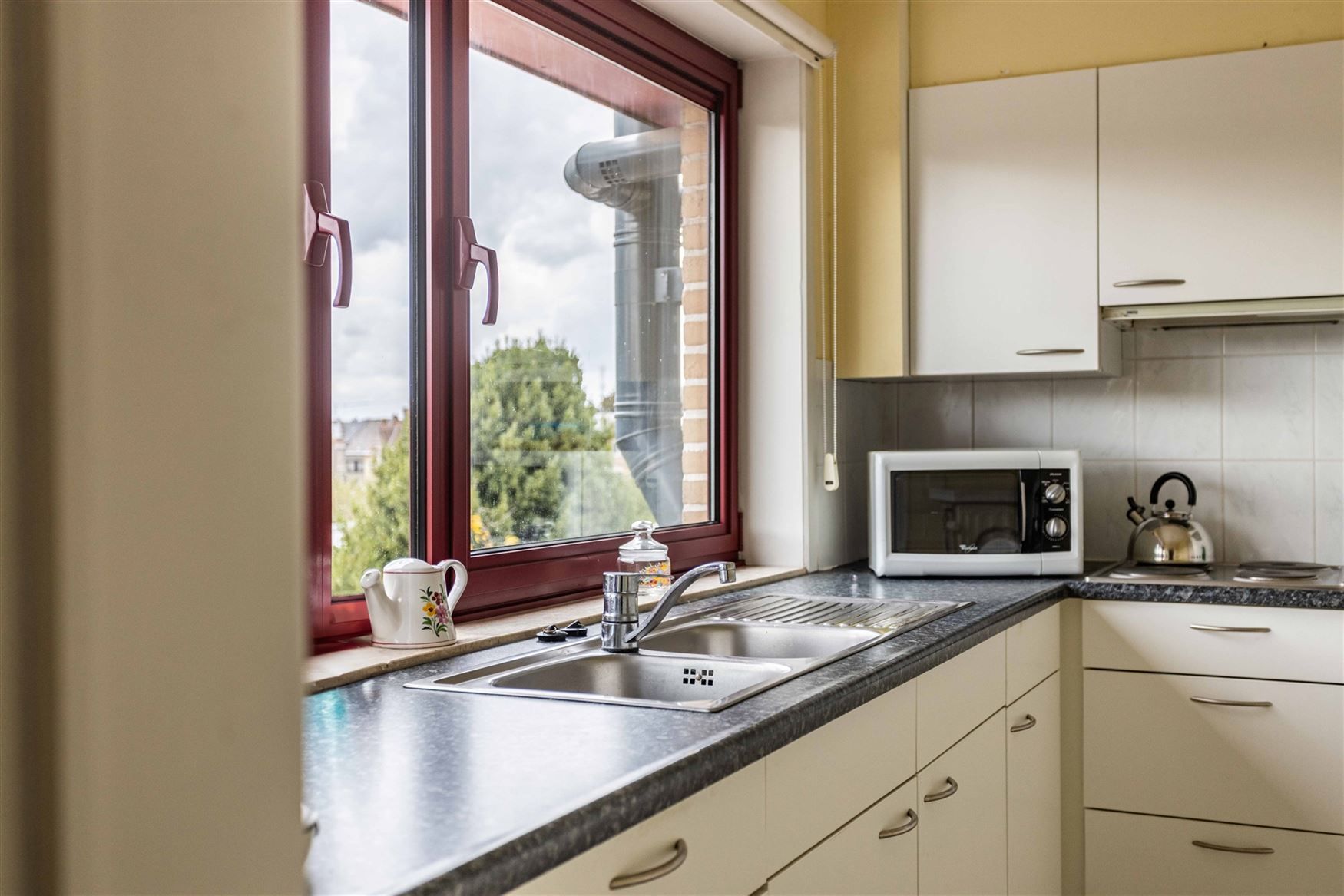 Instapklaar appartement met zonnig terras en topligging in Oudenaarde! foto 8
