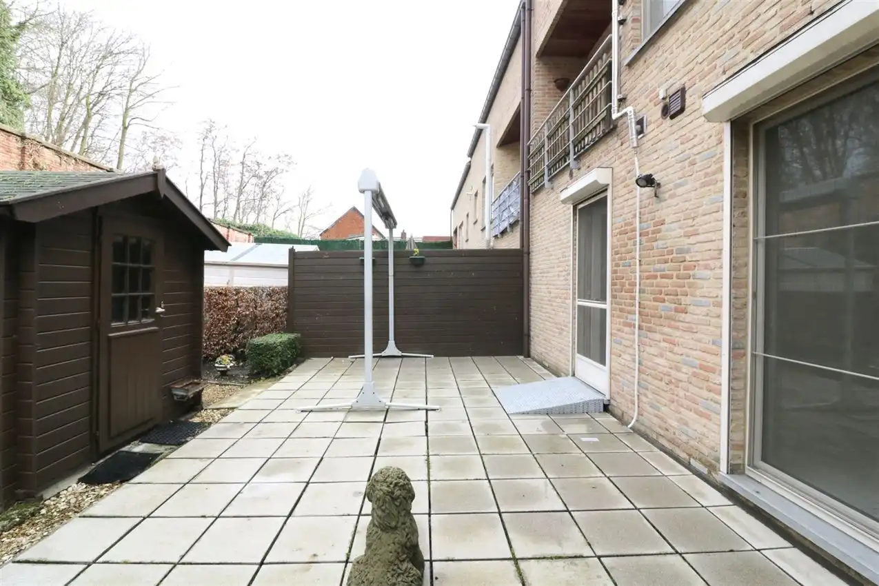 Gelijkvloers wonen met tuintje en autostaanplaats in centrum foto 34