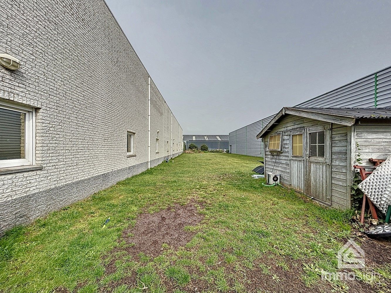 Handelspand met magazijn, kantoorruimte en instapklare woning te Lommel foto 44