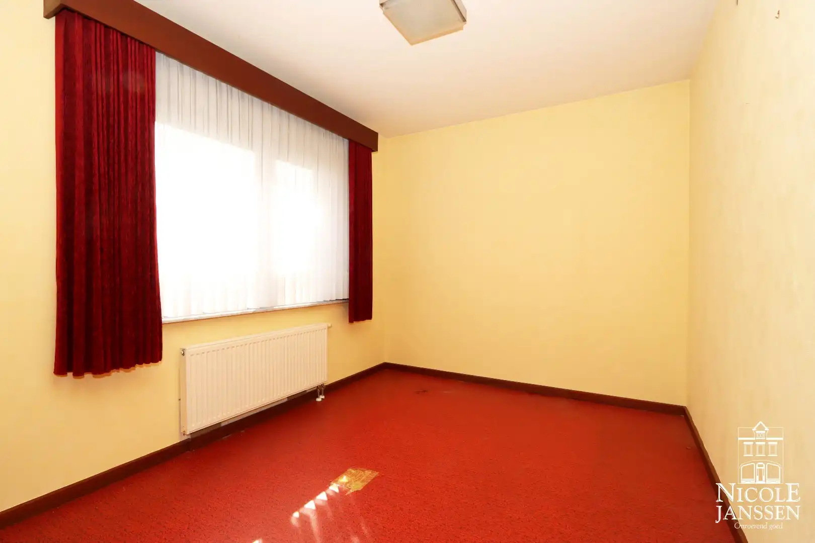 Gelijkvloerse verzorgde woning nabij het centrum van Maaseik foto 12