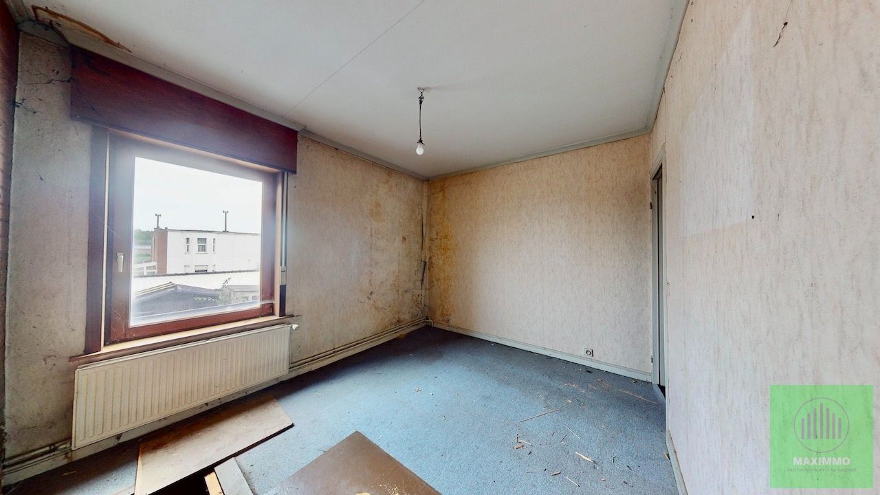 Te koop – Renovatieproject met potentieel in Menen foto 8