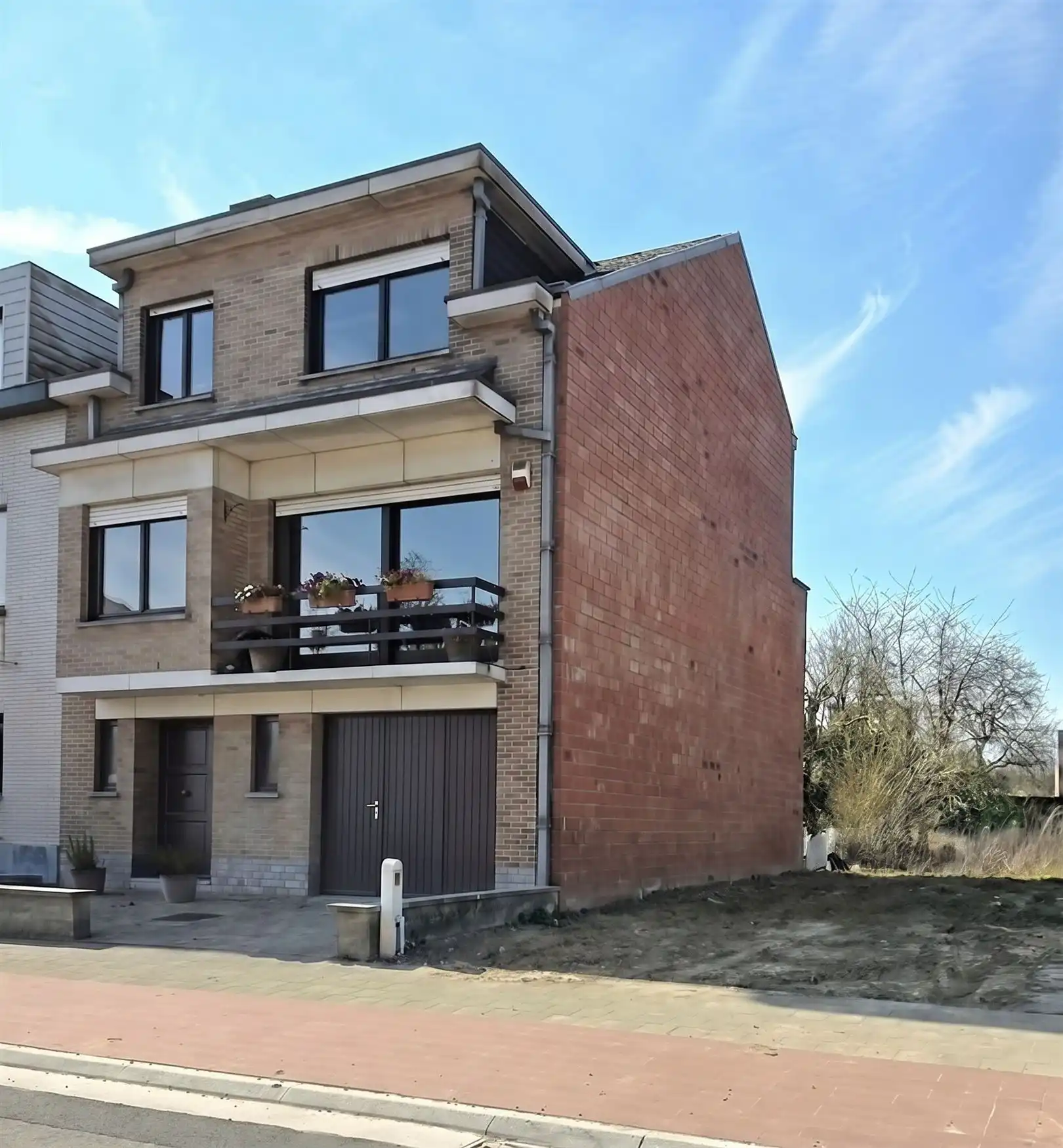Hoofdfoto van de publicatie: Bel-étagewoning met tuin en garage - 3 slpks