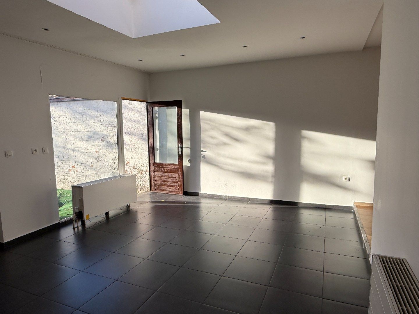 Verzorgd gelijkvloers 1-slpk appartement met tuin foto 7