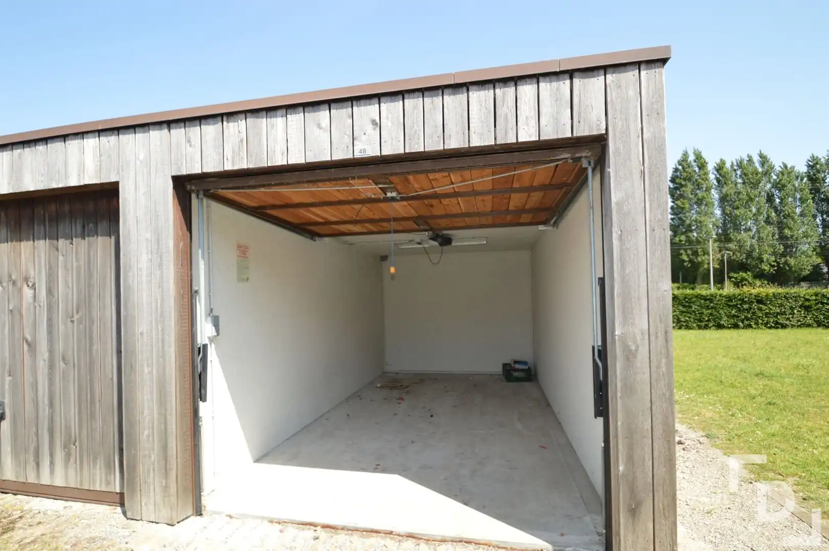 Gelijkvloers appartement met garage en terras foto 14
