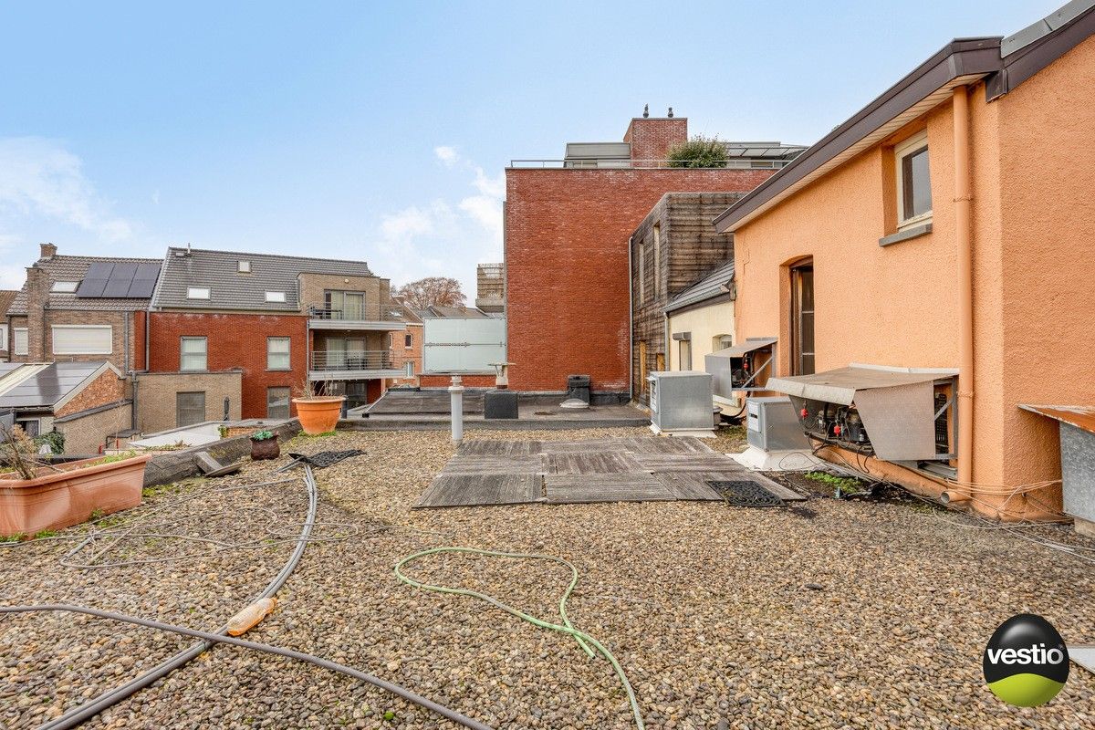 Handelspand met woonst / projectopportuniteit aan de Luikersteenweg. foto 17