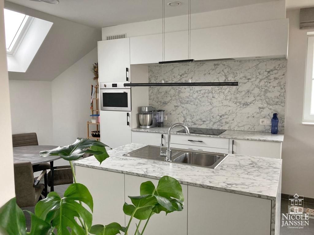 Nieuwbouwappartement met twee slaapkamers, terras en autostandplaats foto 3