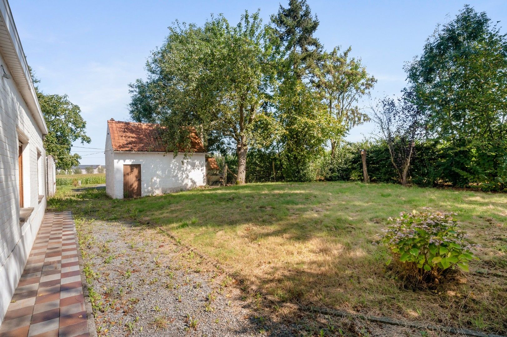 Volledig te renoveren landelijk knus woonhuis of zelf te bouwen woning op deze prachtige locatie in Ingooigem foto 14