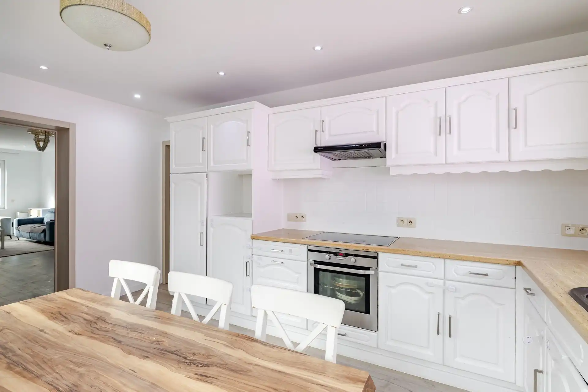 Instapklare woning met 4 slks, garage en aanpalende bouwgrond foto 8