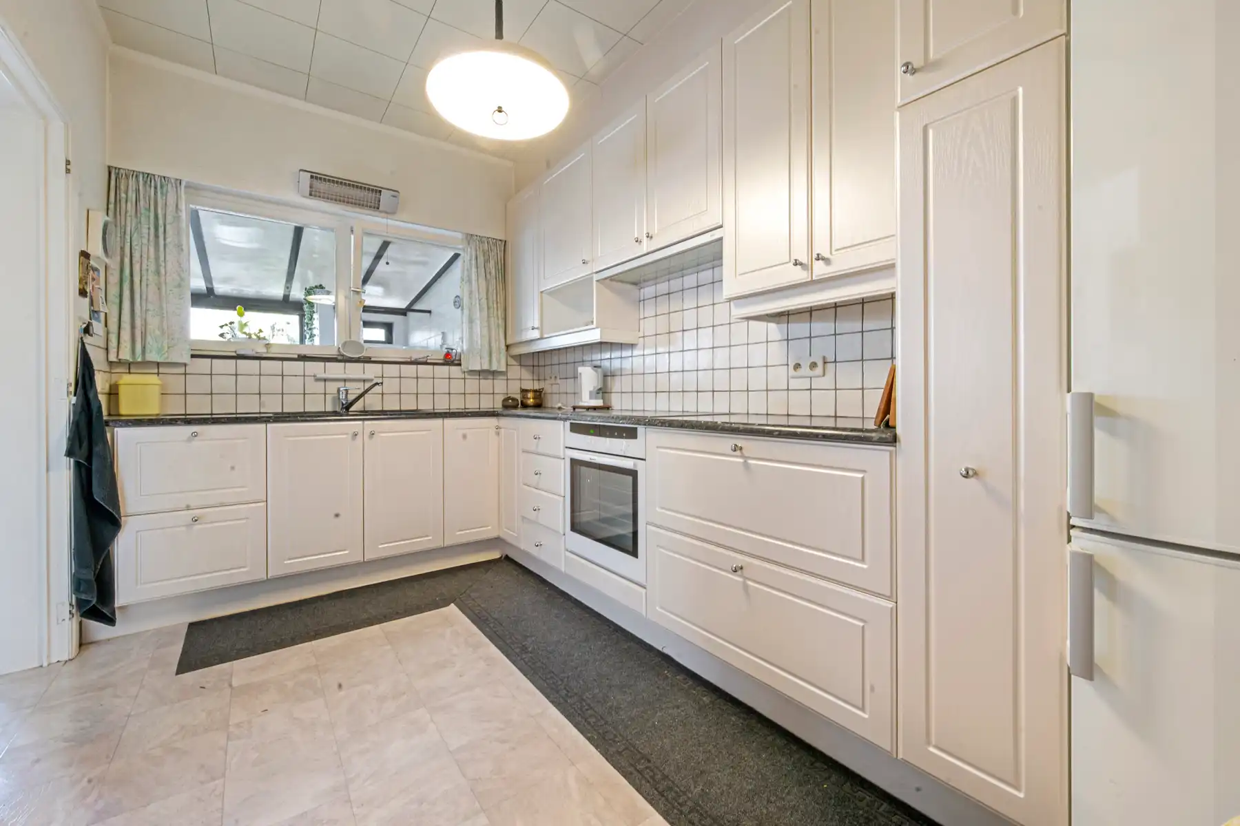 Woning met 2 garageboxen en tuin  foto 6