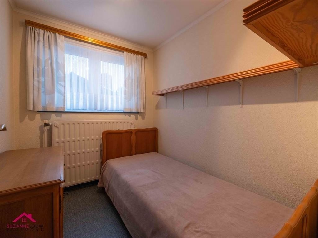 Vrijstaande splitlevel woning, te renoveren naar eigen smaak foto 22