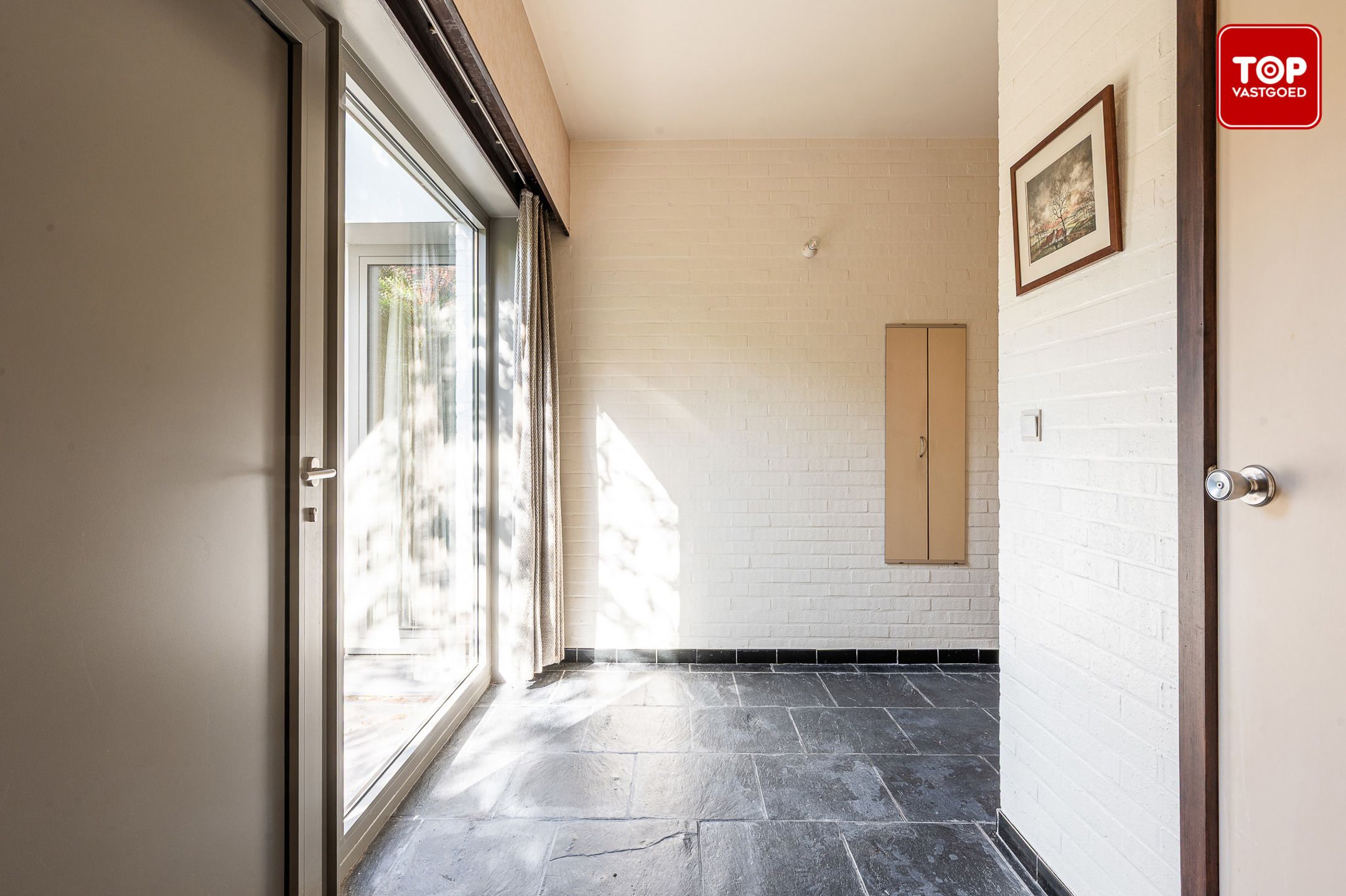 Ruime jaren zeventig villa in Mariakerke-Kolegem foto 4