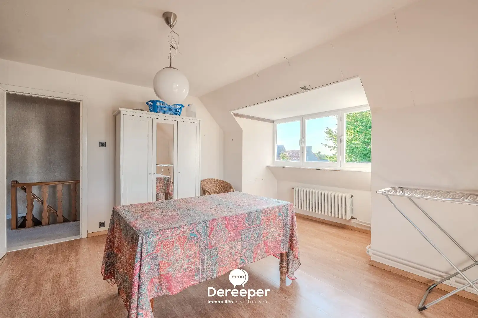 Op te frissen halfopen bel-etagewoning met tuin, garage en 4 slaapkamers foto 10