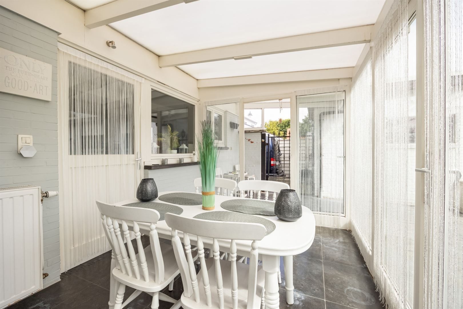 Instapklare halfopen woning met zonnige tuin aan de Vaart Schoten foto 11