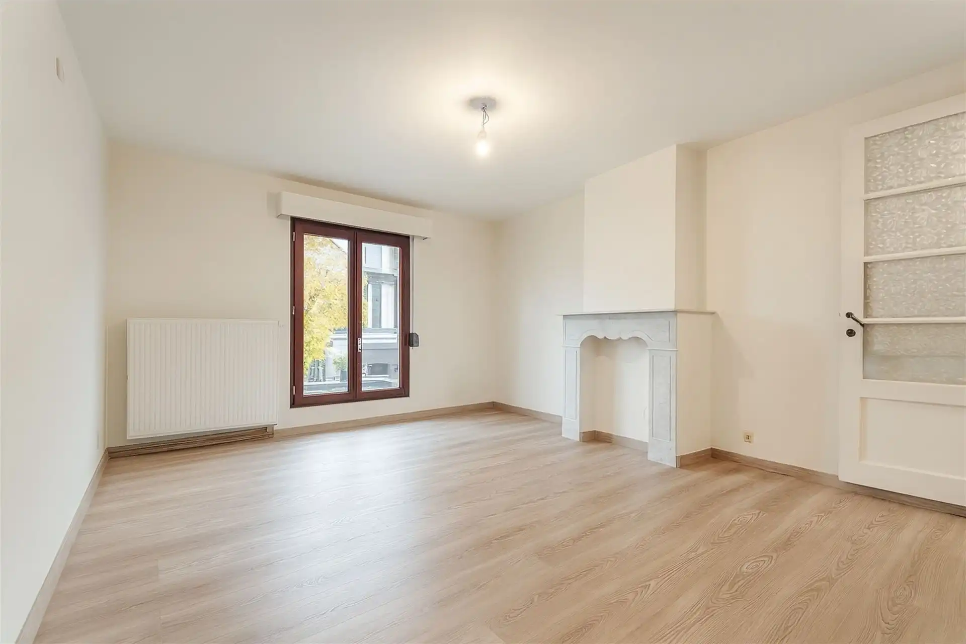 Centraal gelegen stadswoning met 2 slaapkamers, garage en terras foto 8