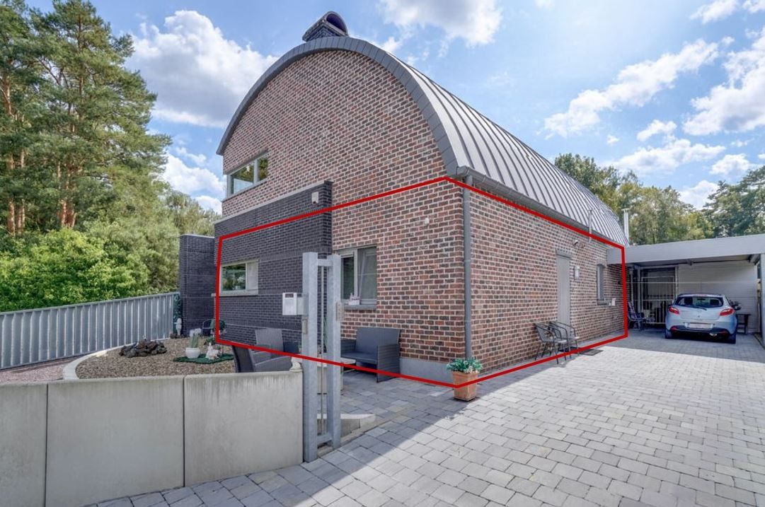 Gelijkvloers appartement met tuin foto {{pictureIndex}}