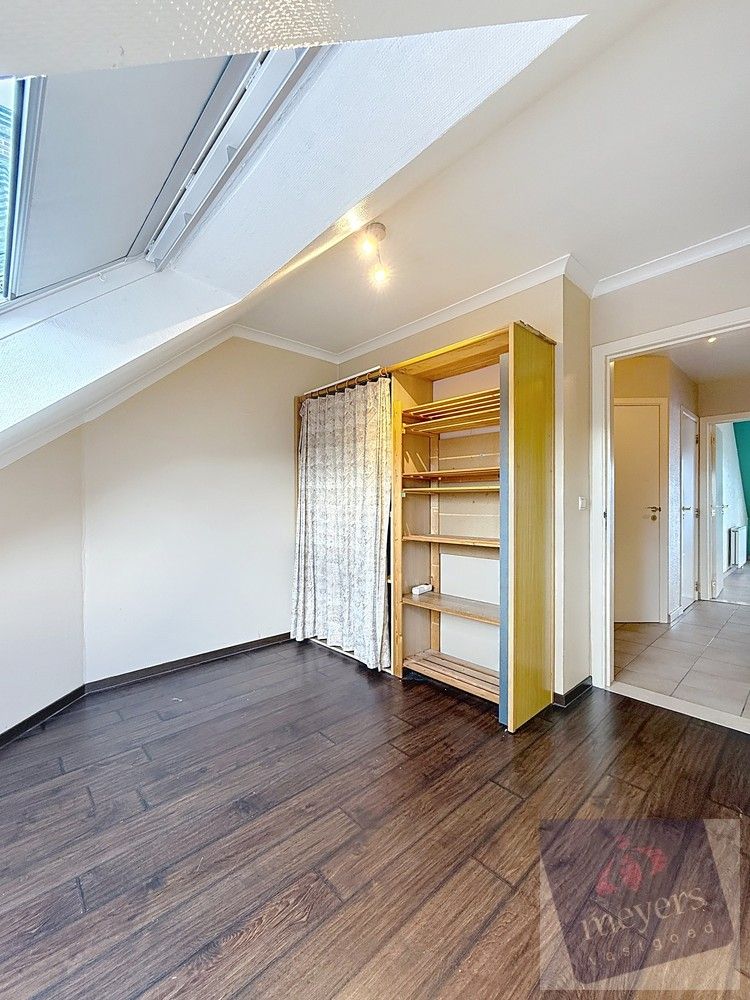 Ruim appartement met garagebox in Bilzen-Schoonbeek foto 6