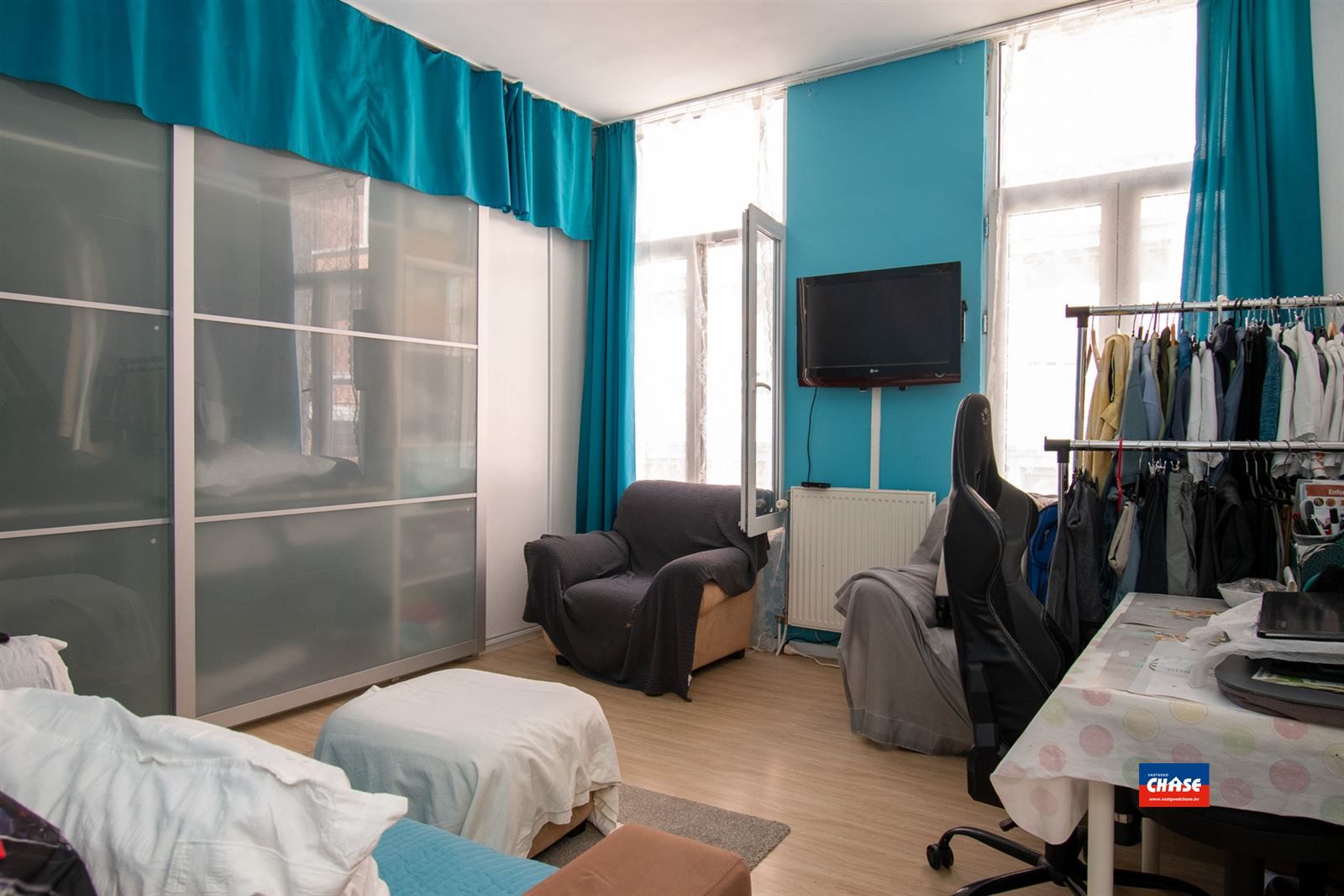 Ruime woning op toplocatie met 4 slaapkamers, 3 keukens en 3 badkamers foto 9