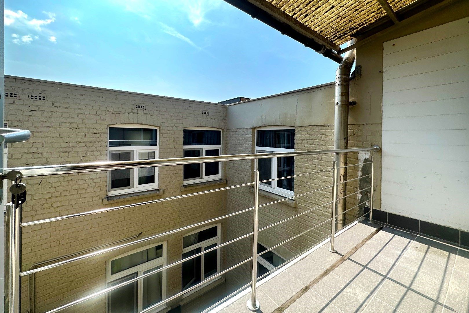 Prachtige interbellumwoning onderverdeeld in drie ruime appartementen foto 16