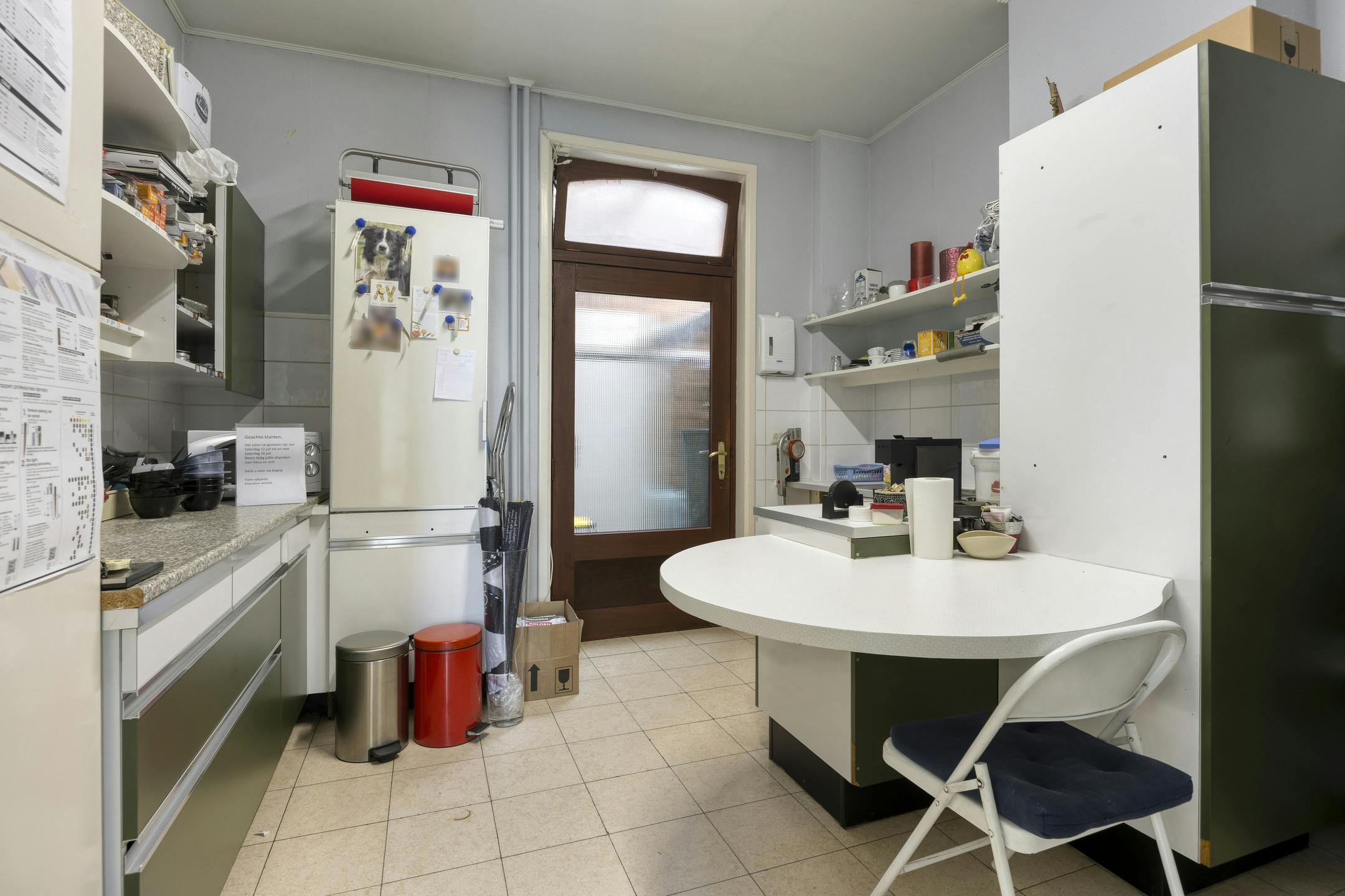 Karaktervolle driegevelwoning met commerciële ruimte in hartje Vilvoorde foto 11