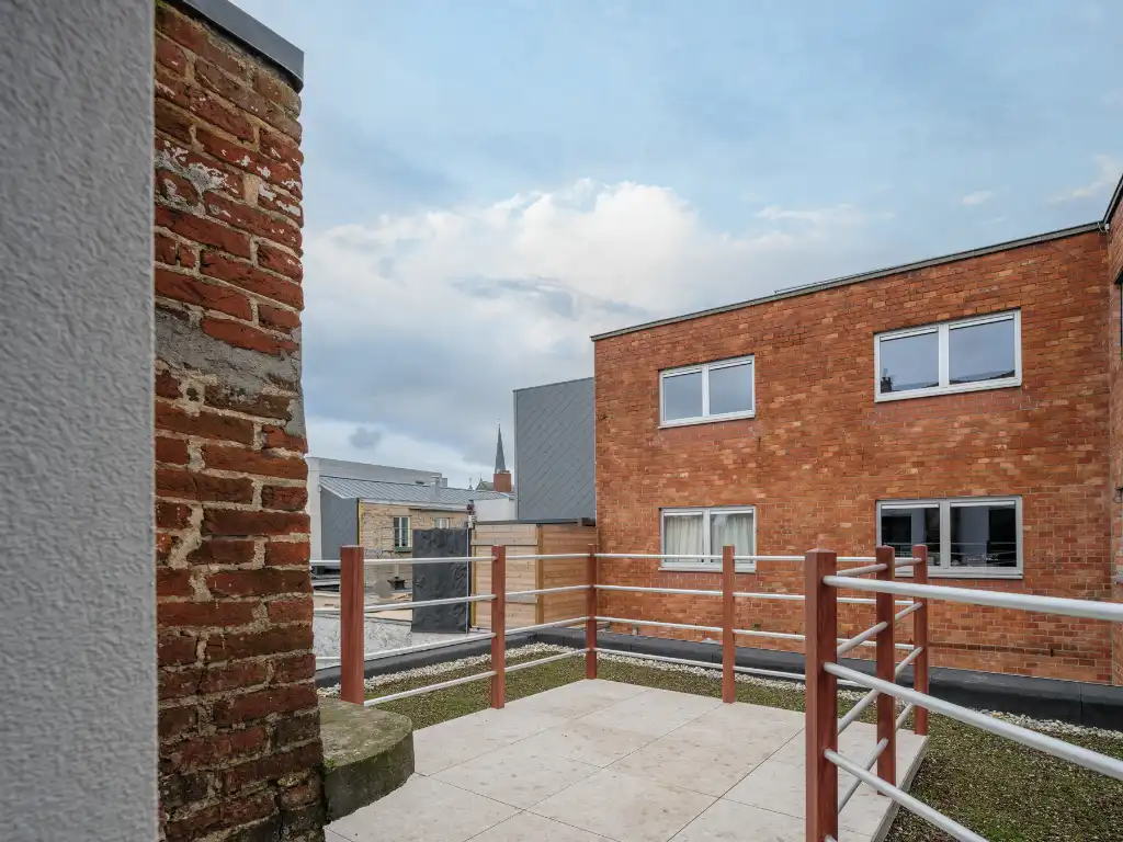 Stijlvol duplex appartement met 2 slaapkamers en terras, centraal gelegen in het bruisende centrum nabij alle belangrijkste straten en pleinen van Gent. foto 14