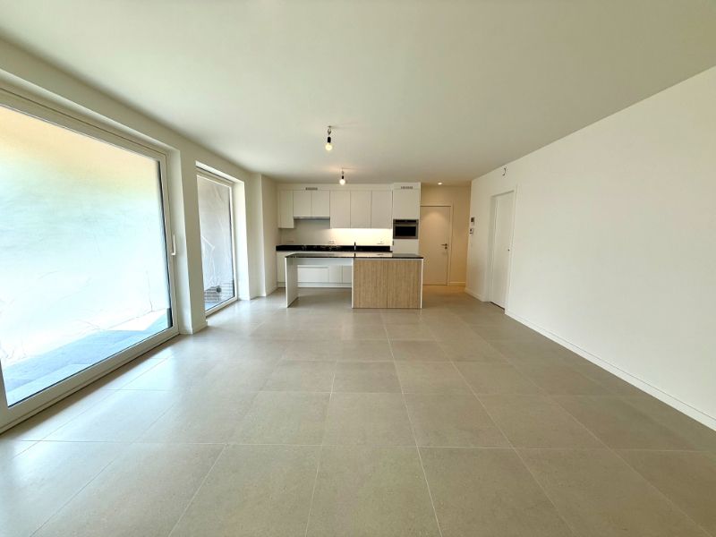 Gelijkvloers nieuwbouwappartement met 1 slaapkamer, zonnig terras en carport foto 6