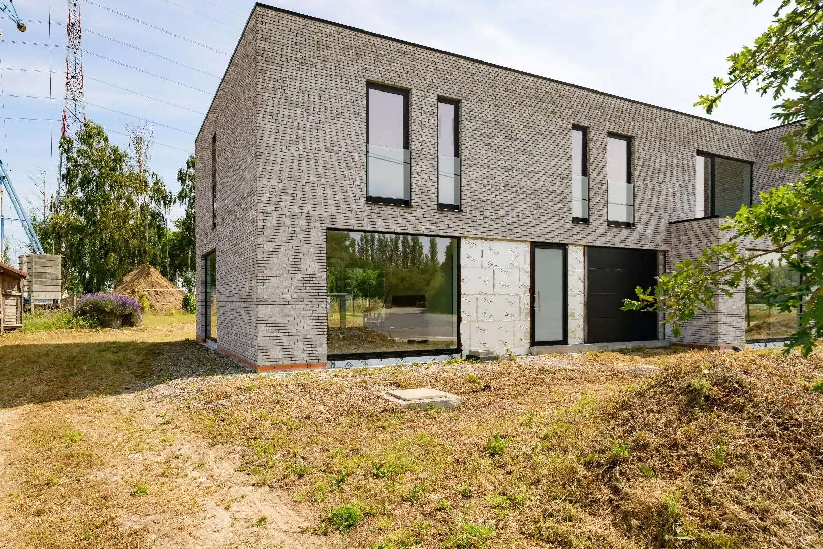 PRACHTIGE MODERNE WONING MET TUIN | GARAGE EN BIJGEBOUW (24 m²) foto 3