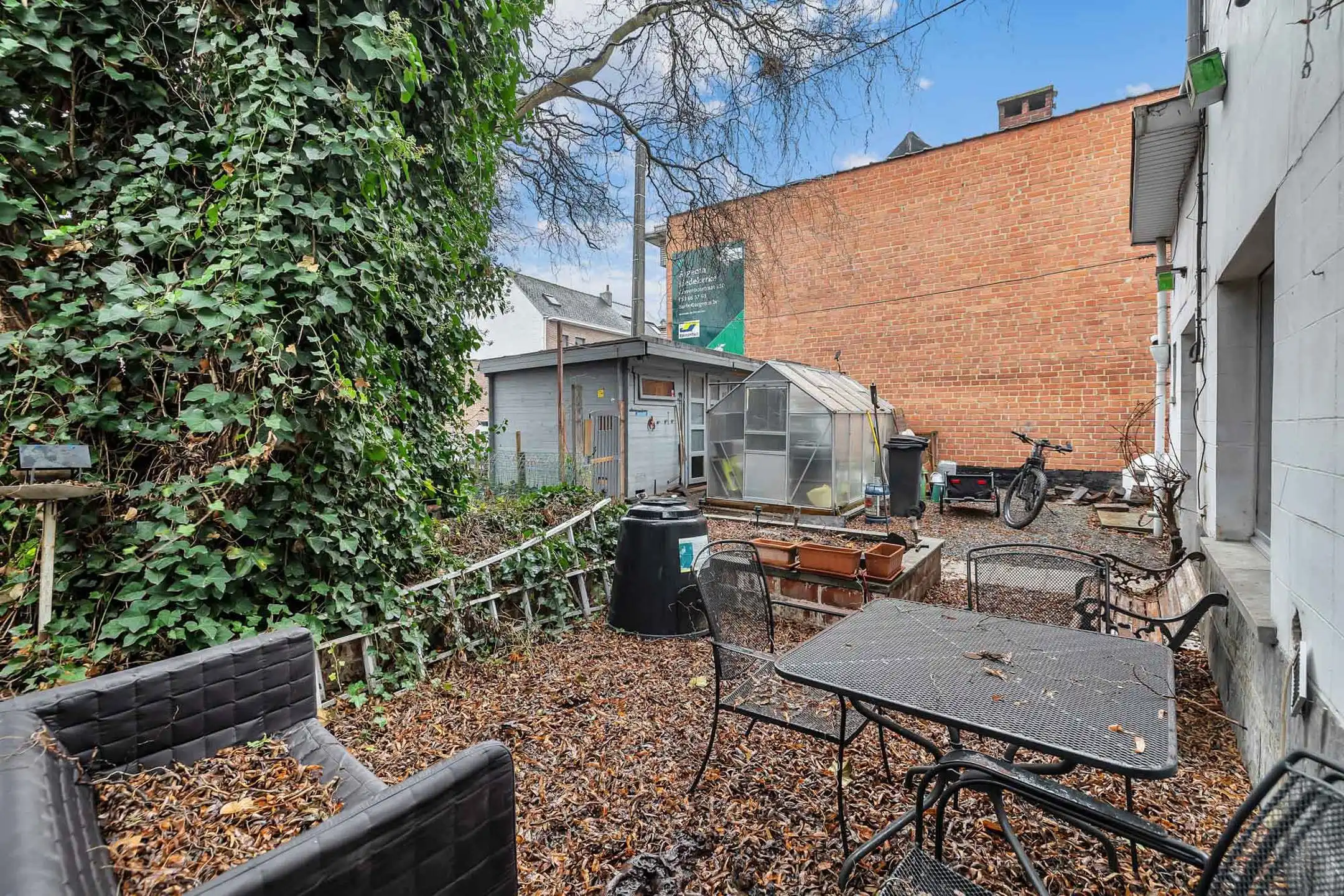 Te renoveren woning met tuin op commerciële ligging foto 20