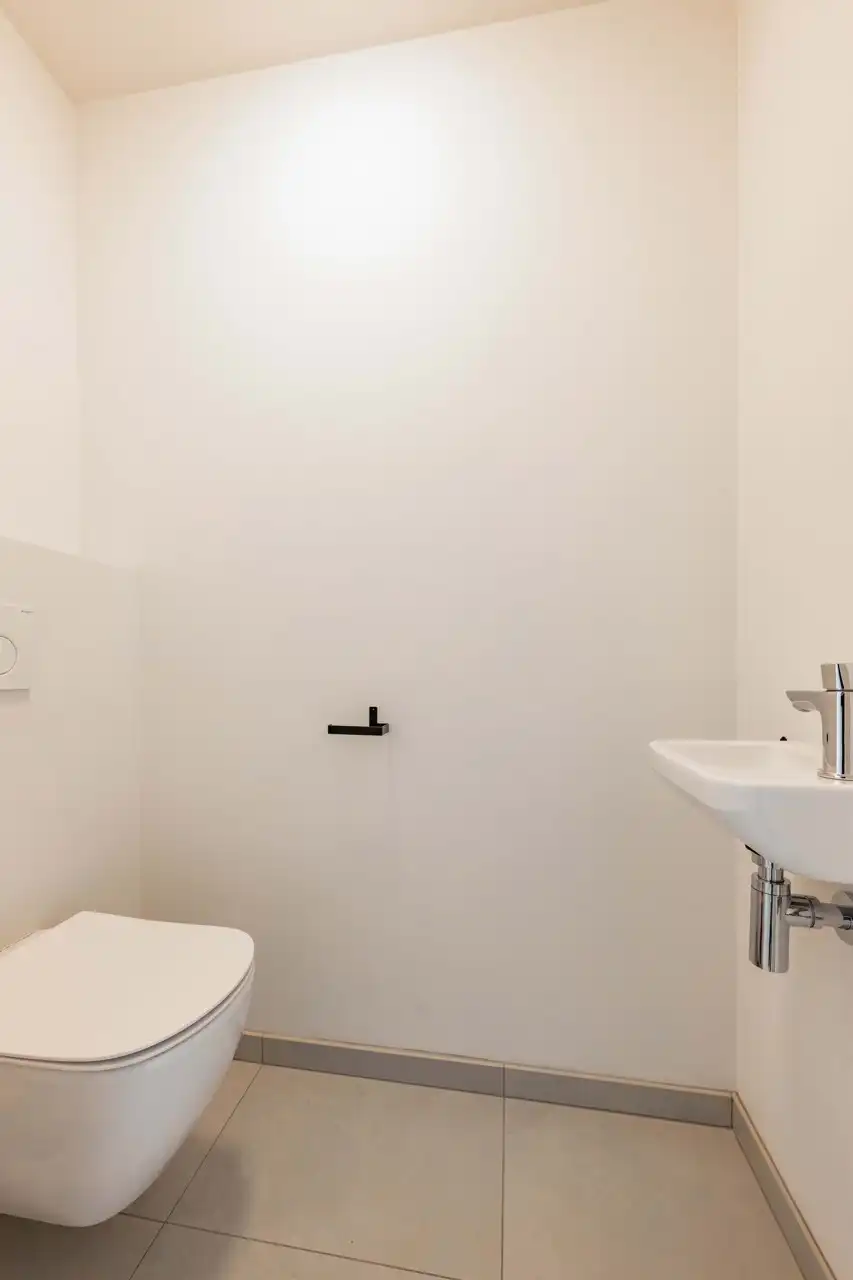 Instapklaar 1-slaapkamerappartement met terras TE HUUR in het centrum van Wielsbeke! foto 4