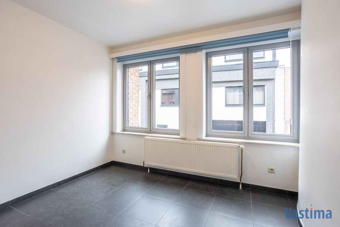 Lichtrijk leefappartement met 2 slaapkamers, ruim terras en garage foto 7