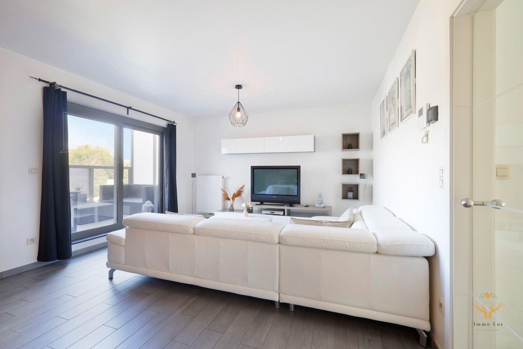 Klassevol 2 slaapkamerappartement met garage foto 8
