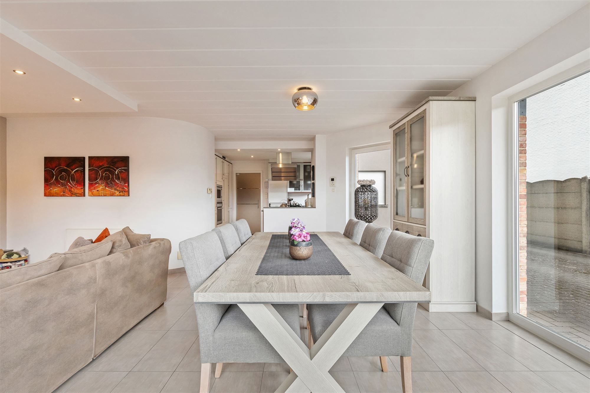 PERFECT ONDERHOUDEN GELIJKVLOERS APPARTEMENT MET 2 SLAAPKAMERS EN RUIME TUIN MET CARPORT EN BERGING TE HEUSDEN foto 9