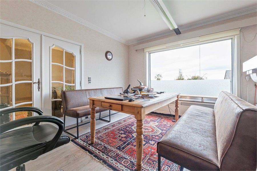 RUIME GEZINSWONING BOORDEVOL POTENTIEEL IN NIEUWERKERKEN foto 10