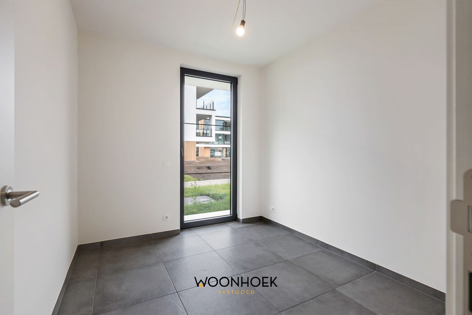 Luxueus 2-slpk nieuwbouwappartement OEVERPARK te Lokeren foto 13