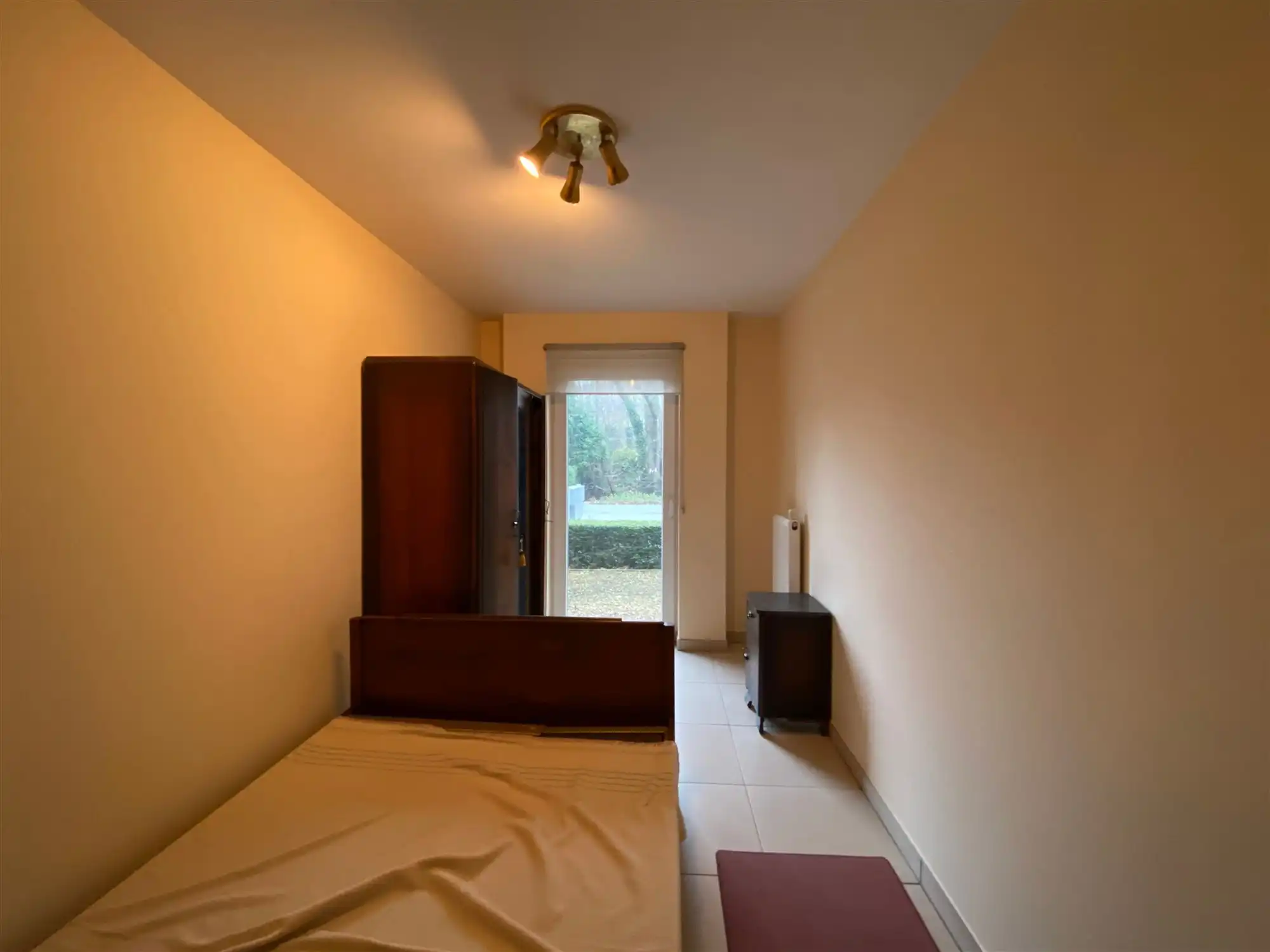 Ruim gelijkvloers appartement met twee slaapkamers, berging en ondergrondse autostaanplaats foto 14