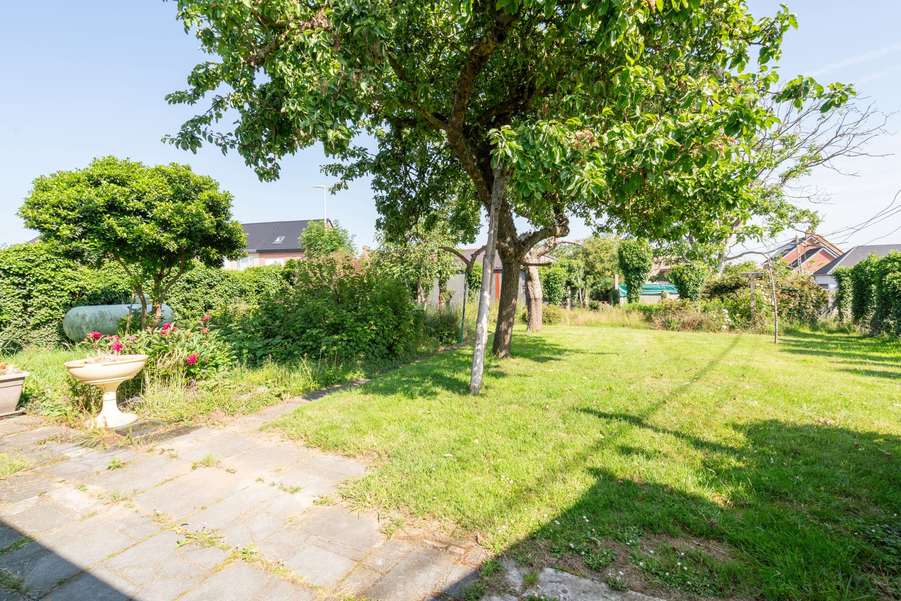 Te renoveren woning met 4 slaapkamers en mooie tuin in het rustige Haaltert foto 21