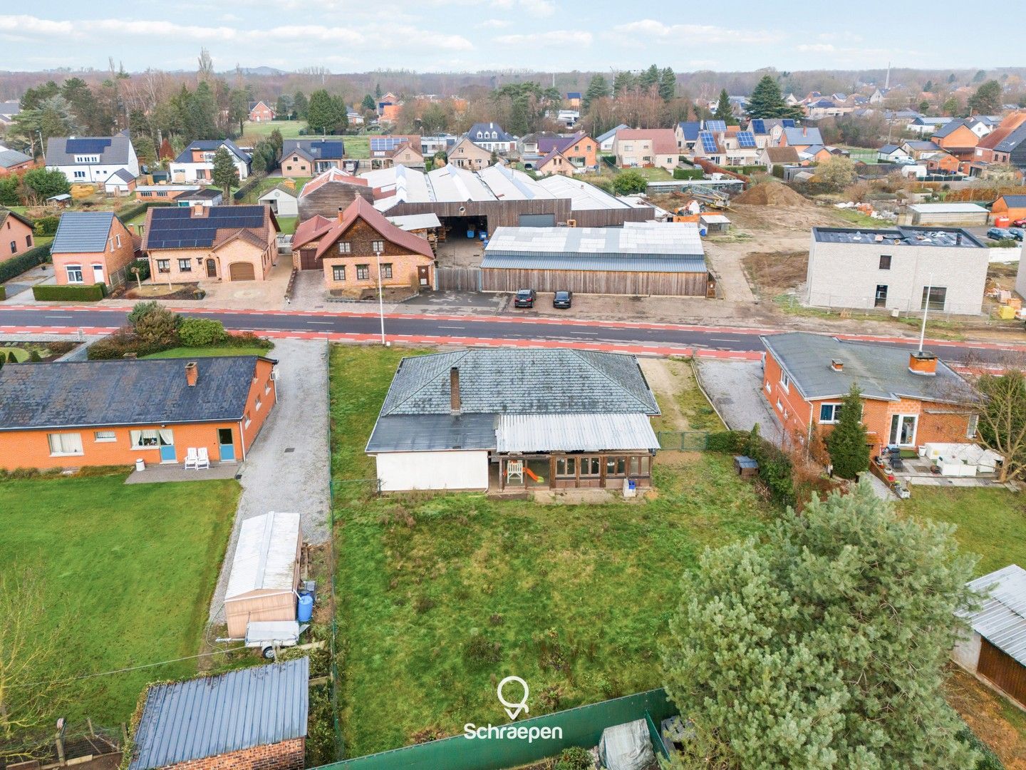 Gelijkvloerse woning op zuidoostelijk perceel van 10,5 are én straatbreedte van maar liefst 30 meter! foto 30