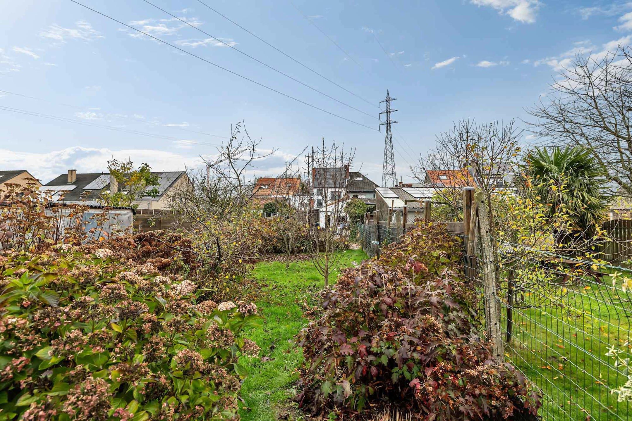 Ruime instapklare woning met 3 slpks en tuin foto 29