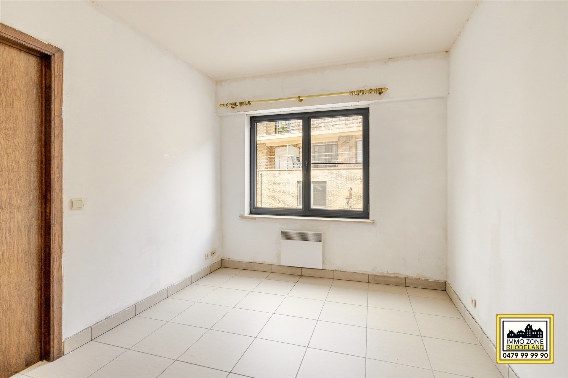 Centraal gelegen appartement met 2 slpks en gem. terras foto 11