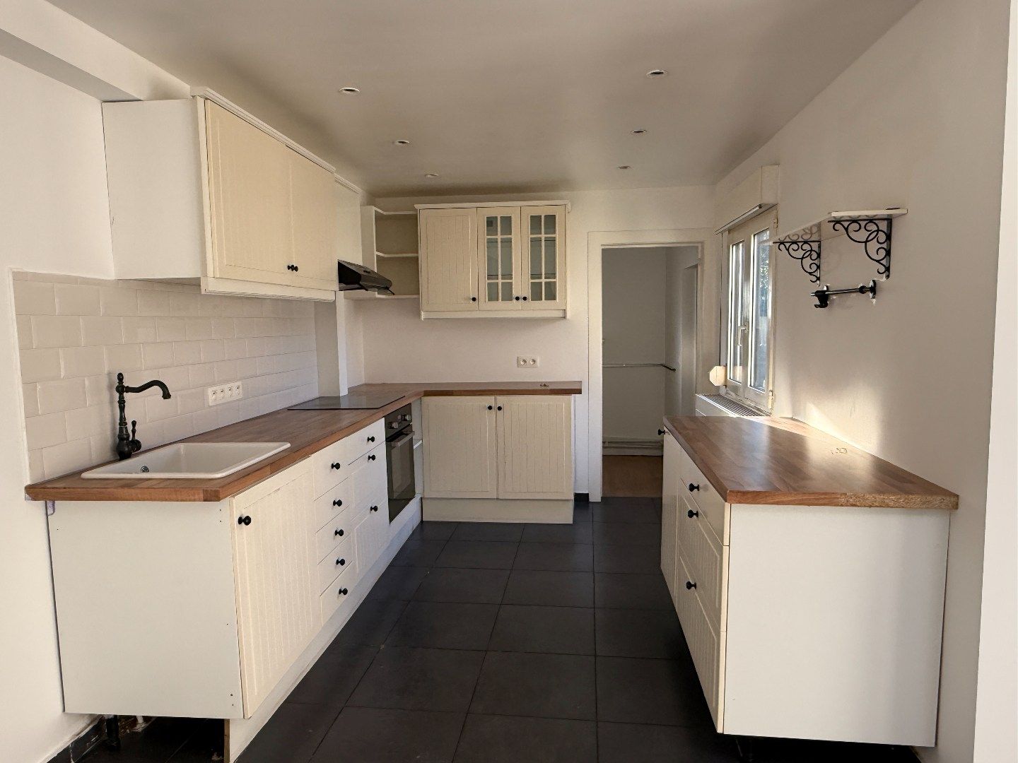 Verzorgd gelijkvloers 1-slpk appartement met tuin foto 8