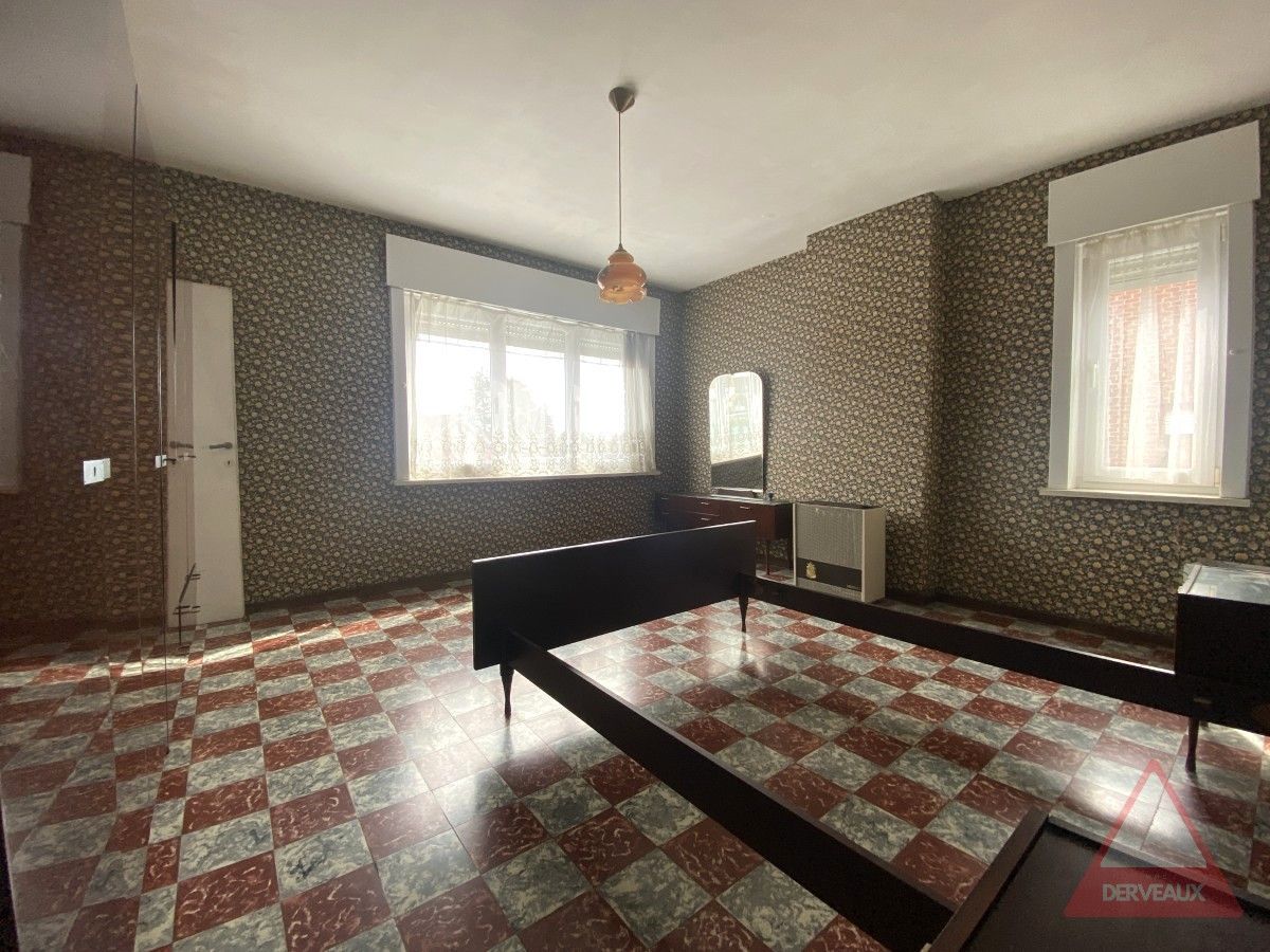 Passendale – Te renoveren woning met tuin, garage en vaste trap naar zolder foto 6