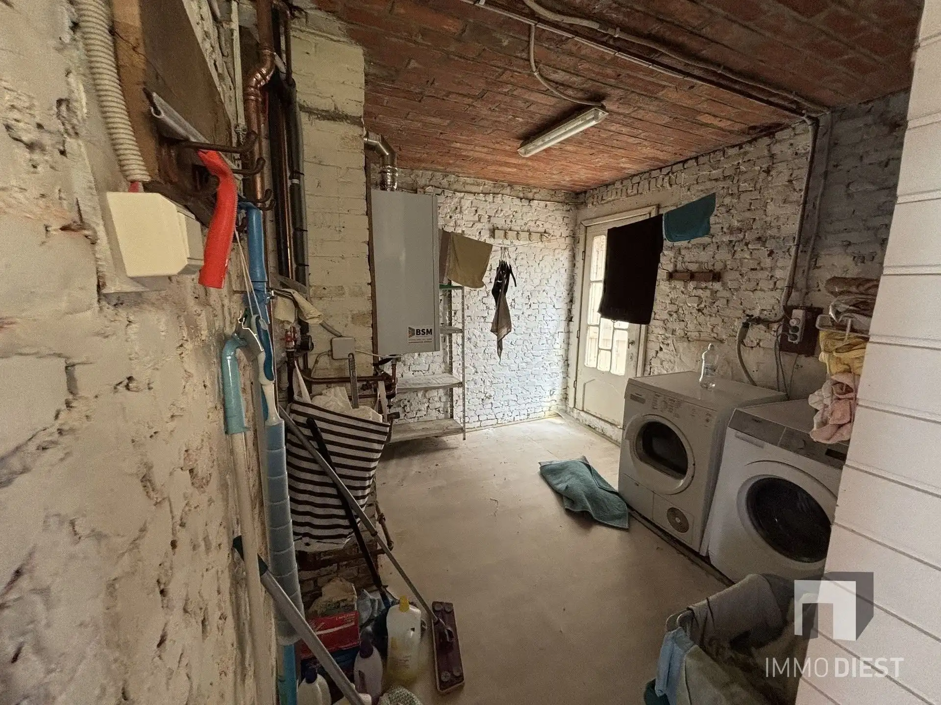 Ruime kluswoning met 3 slaapkamers, garage en tuin foto 16