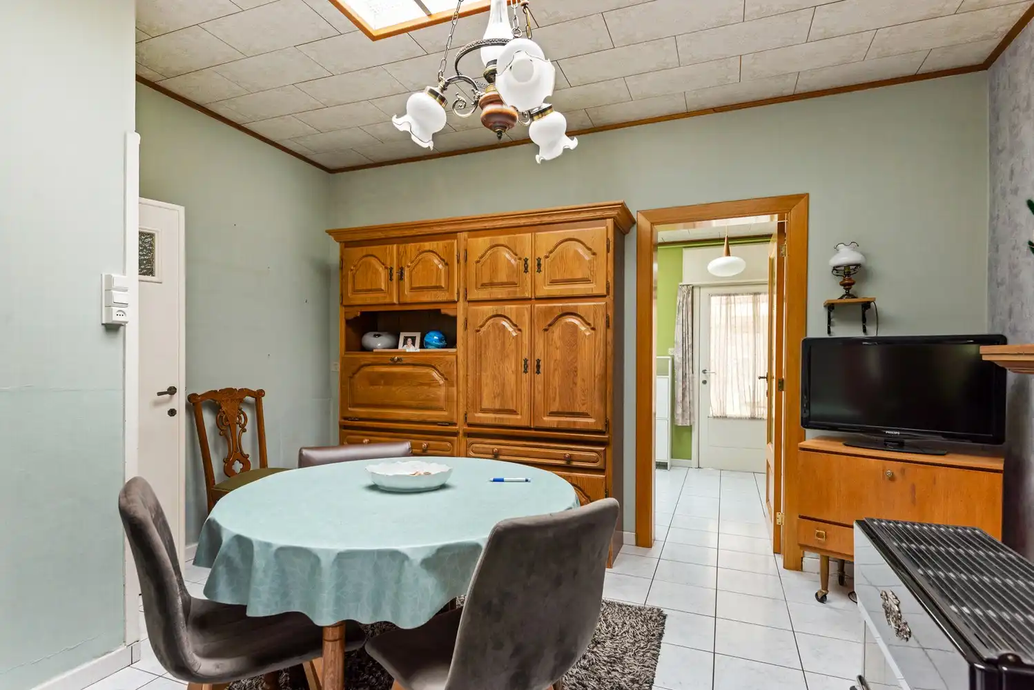 Te renoveren woning met 3 slaapkamers, veel potentieel en een groene tuin in Lier! foto 5