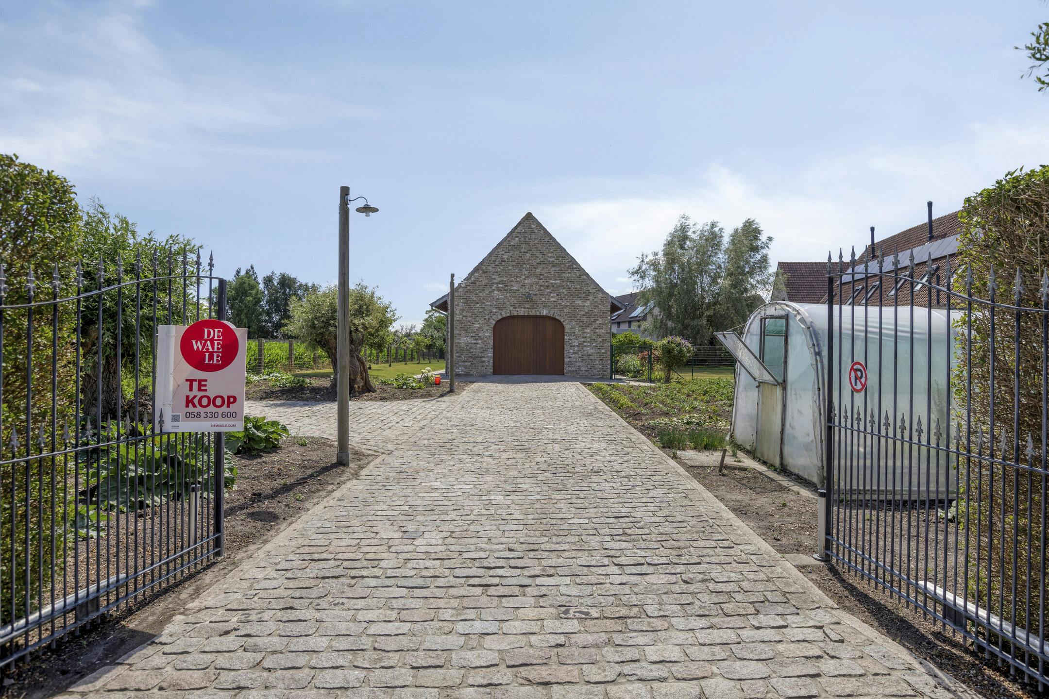 Ruime, energiezuinige woning met bijgebouw op 1.700m² in Beauvoorde. foto 25