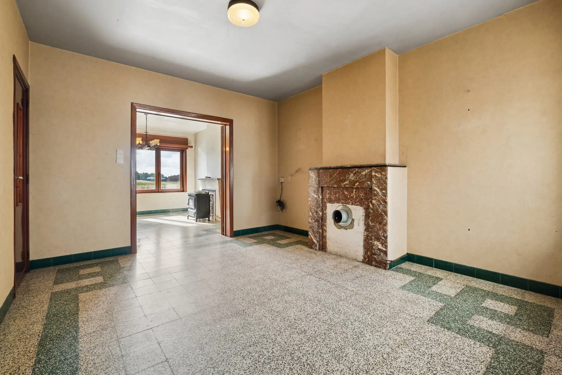 Te renoveren woning met tuin op centrale ligging foto 5