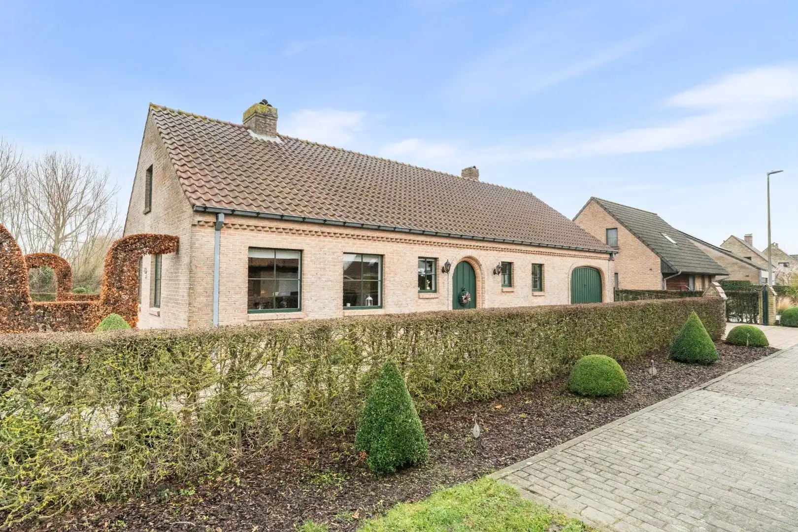 Hoofdfoto van de publicatie: Charmante villa met open zicht in doodlopende straat te Sijsele